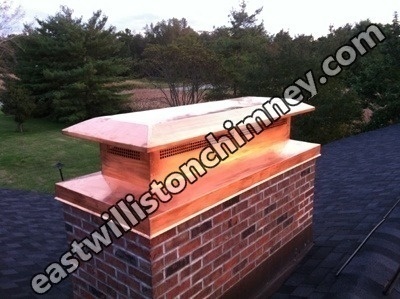 Before and after chimney cap replacement in East Williston, NY
