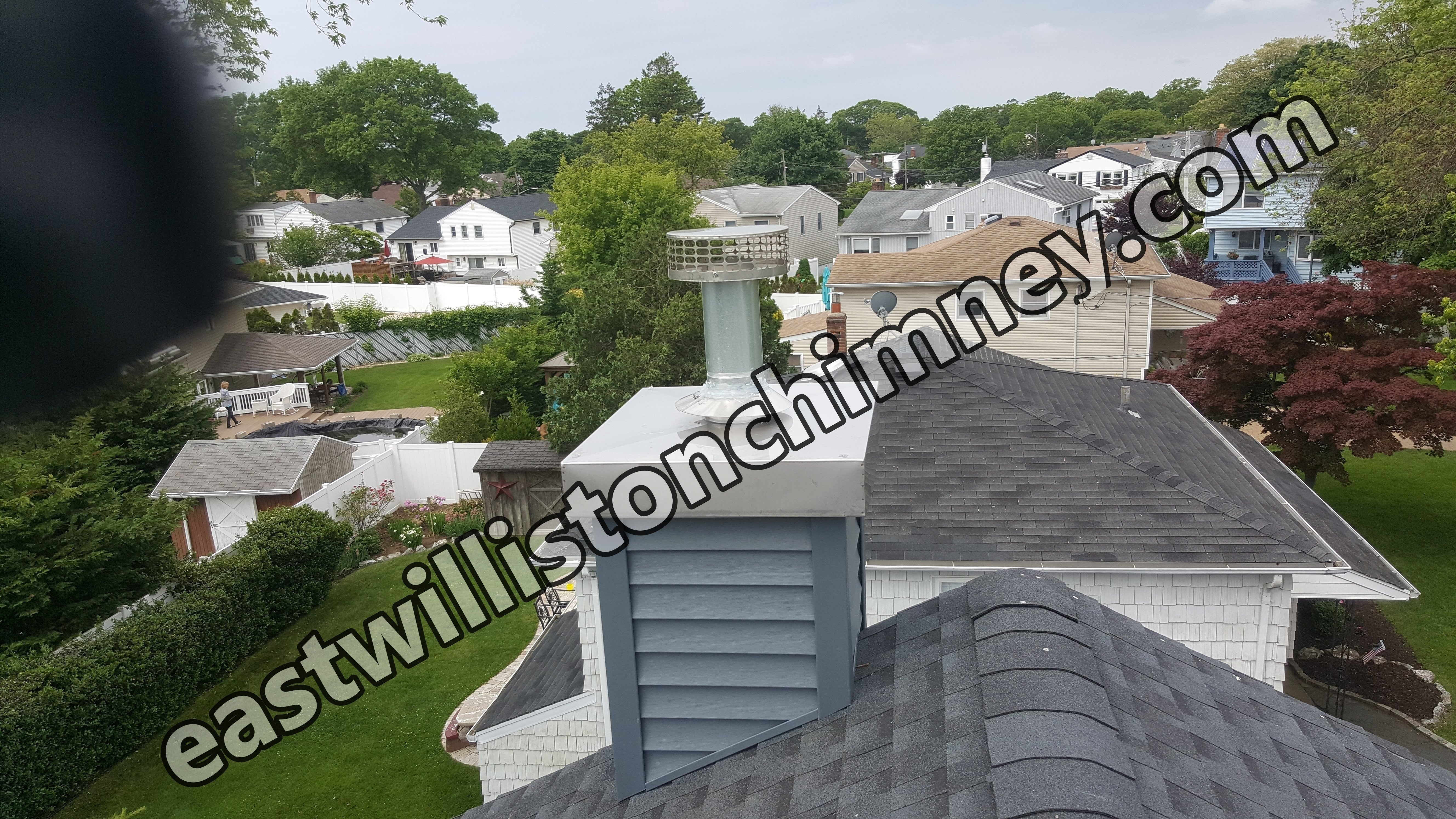 Complete chimney crown rebuild and waterproofing in East Williston, New York